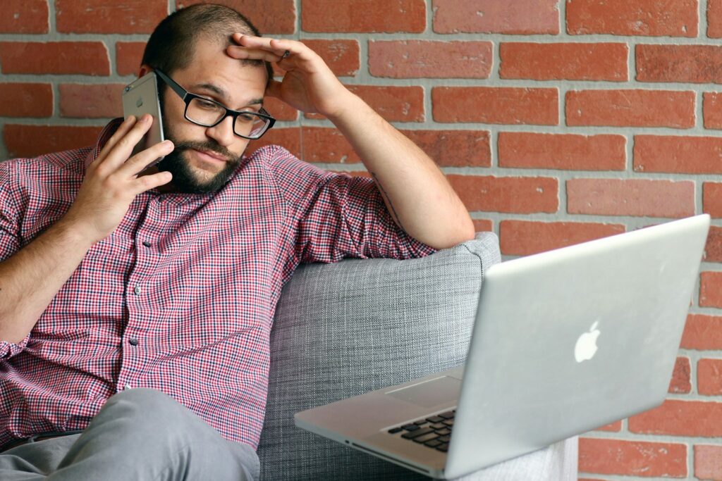 a man with a laptop